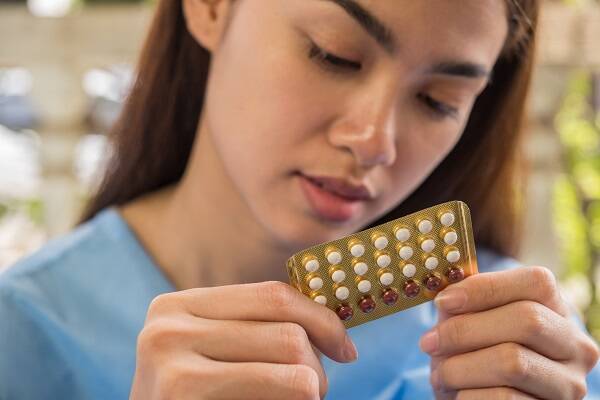 Woman hand holding a contraceptive panel prevent pregnancy